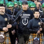 Marching the Green Wave onto the field 2019